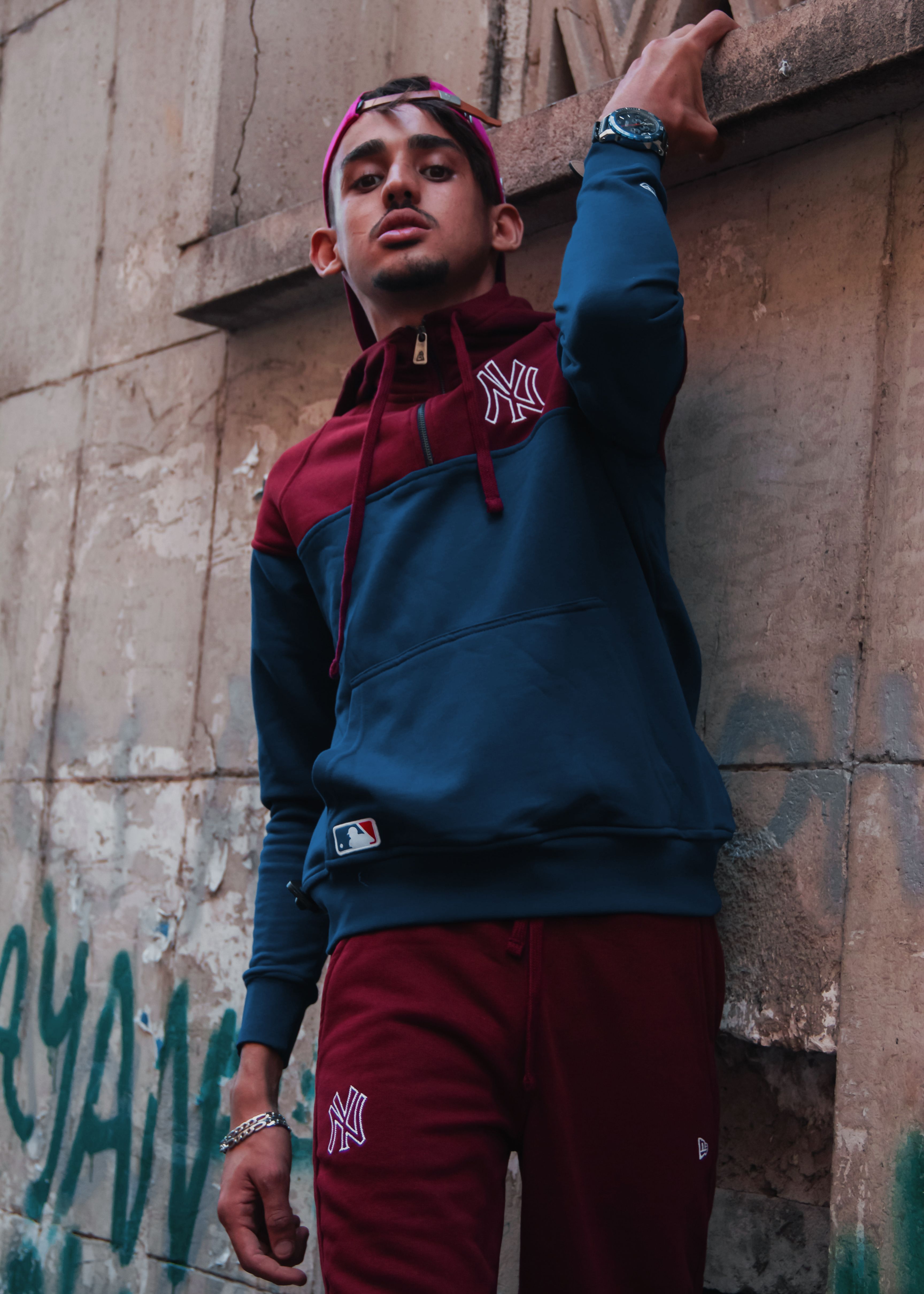 Tracksuit outfit styled with streetwear sneakers