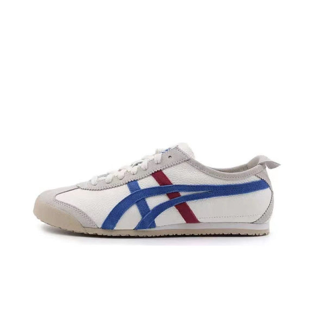 White sneaker with blue and red stripes, beige toe cap, and gray accents.