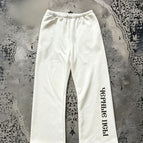 White sweatpants with wide-leg legs