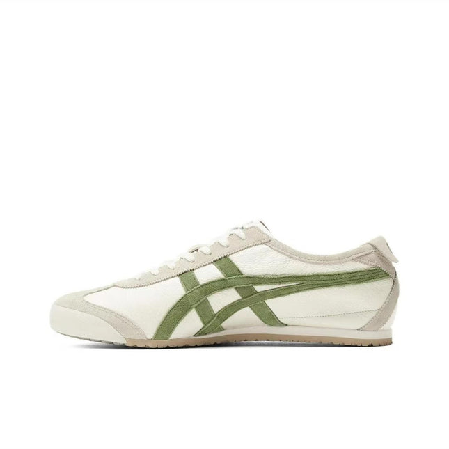 White sneaker with green stripes and beige accents on a white background.
