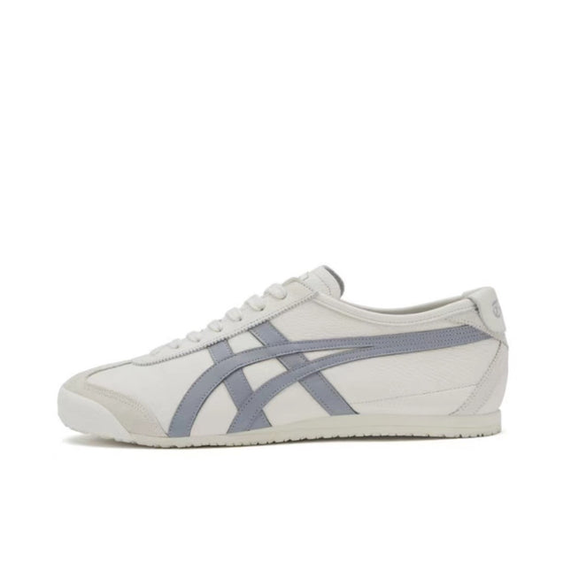 White sneaker with gray stripes and laces, featuring a minimalist design and flat sole.