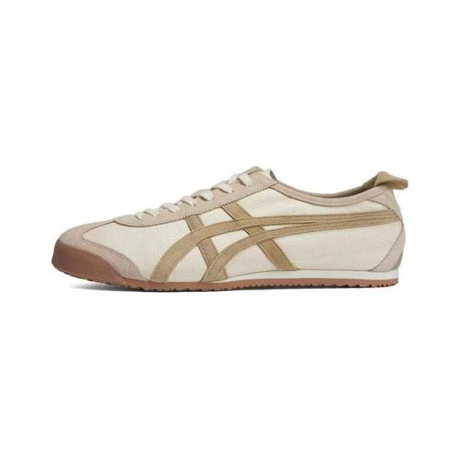 Beige sneaker with tan stripes and brown sole, featuring a simple, low-cut design.