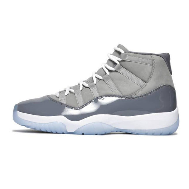 Gray and white sneaker with reflective silver accents on a white background