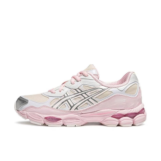 Pink and white sneaker with silver accents, mesh panels, and a cushioned sole.