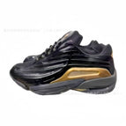 Yun Gong duck shoes are bright black and gold-rimmed