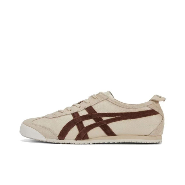 Beige sneaker with brown stripes, white sole, and textured stitching, side view.
