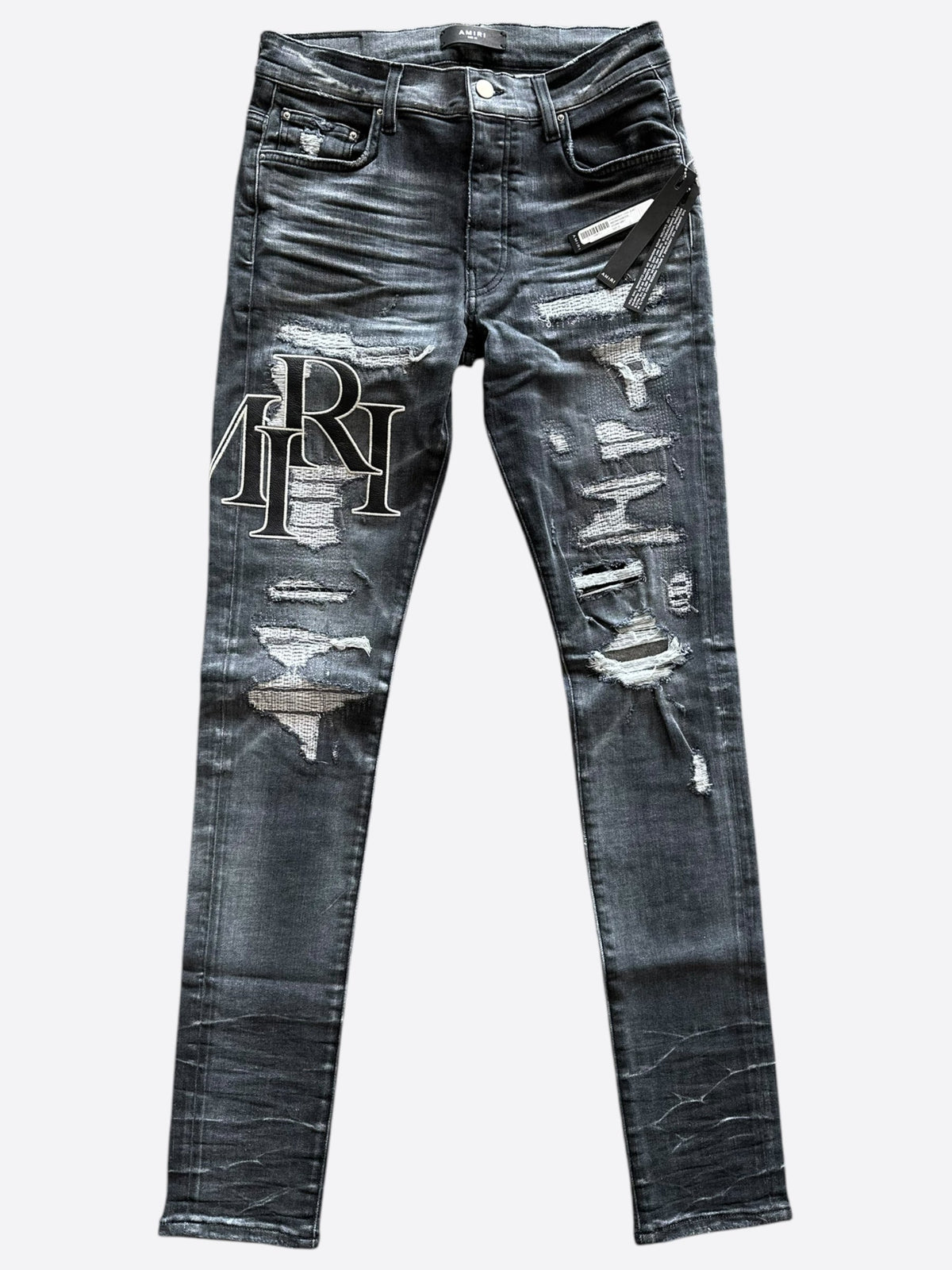 AMIRI Distressed Staggered Logo Jeans