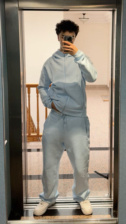 Light blue NOCTA Tech Fleece tracksuit mirror outfit